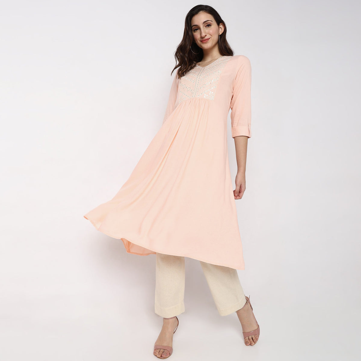 Women Wearing Flare Fit Embellished Kurta