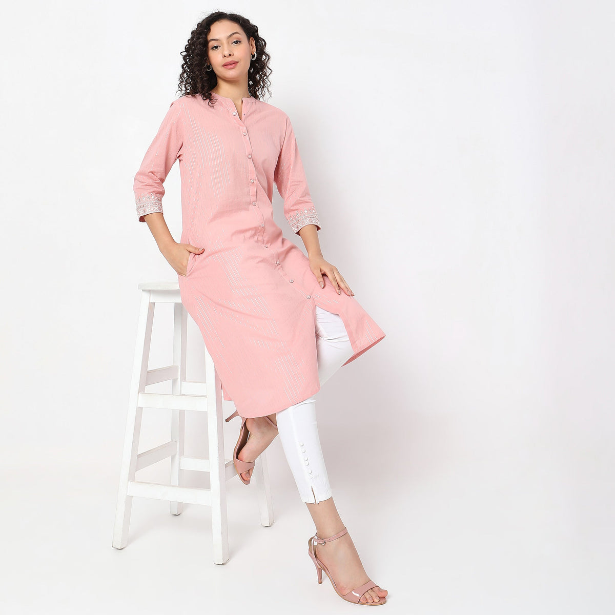 Women Wearing Flare Fit Solid Kurta