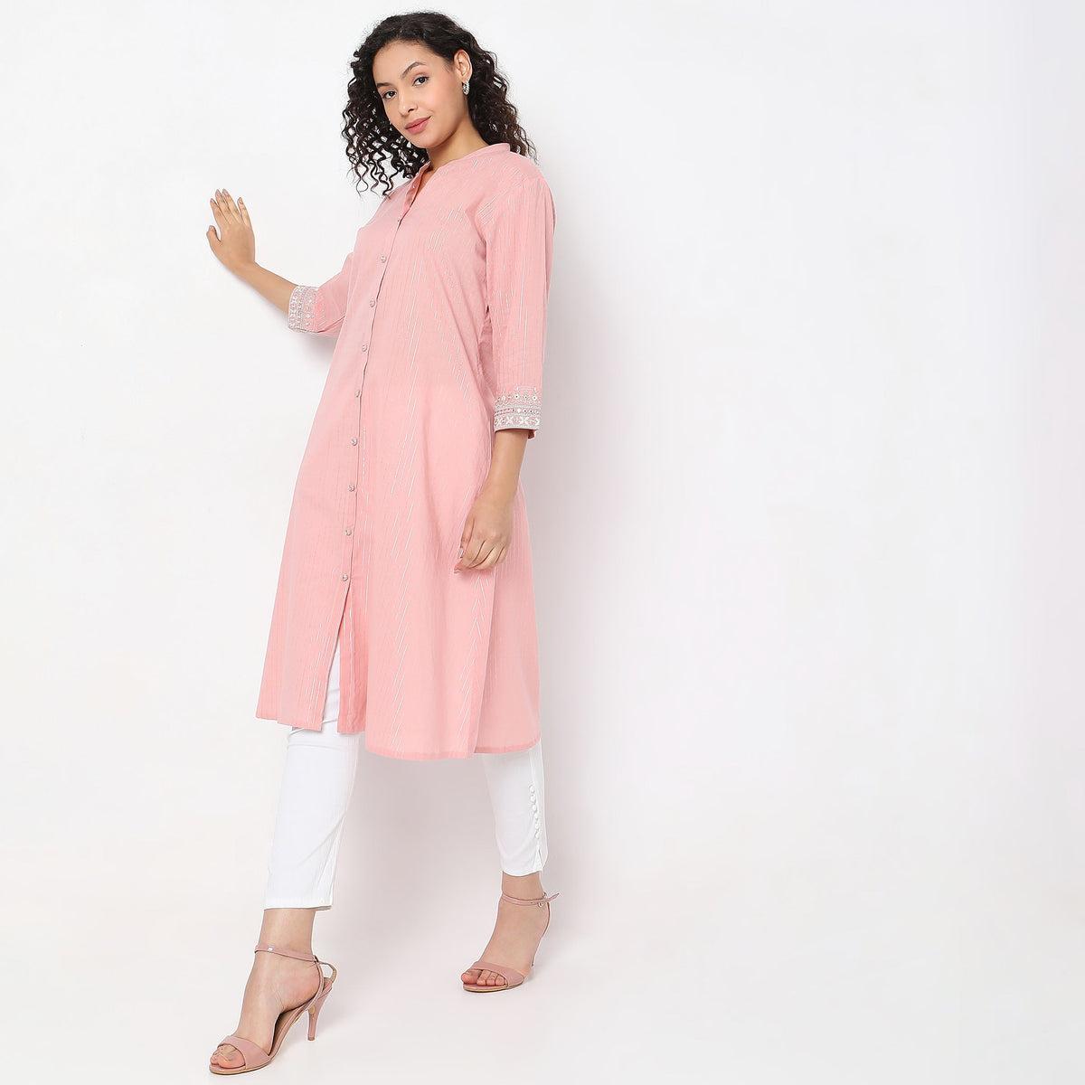 Women Wearing Flare Fit Solid Kurta