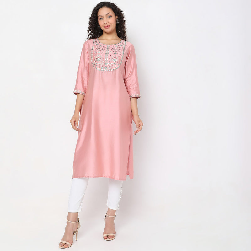 Women Wearing Flare Fit Embroidered Kurta