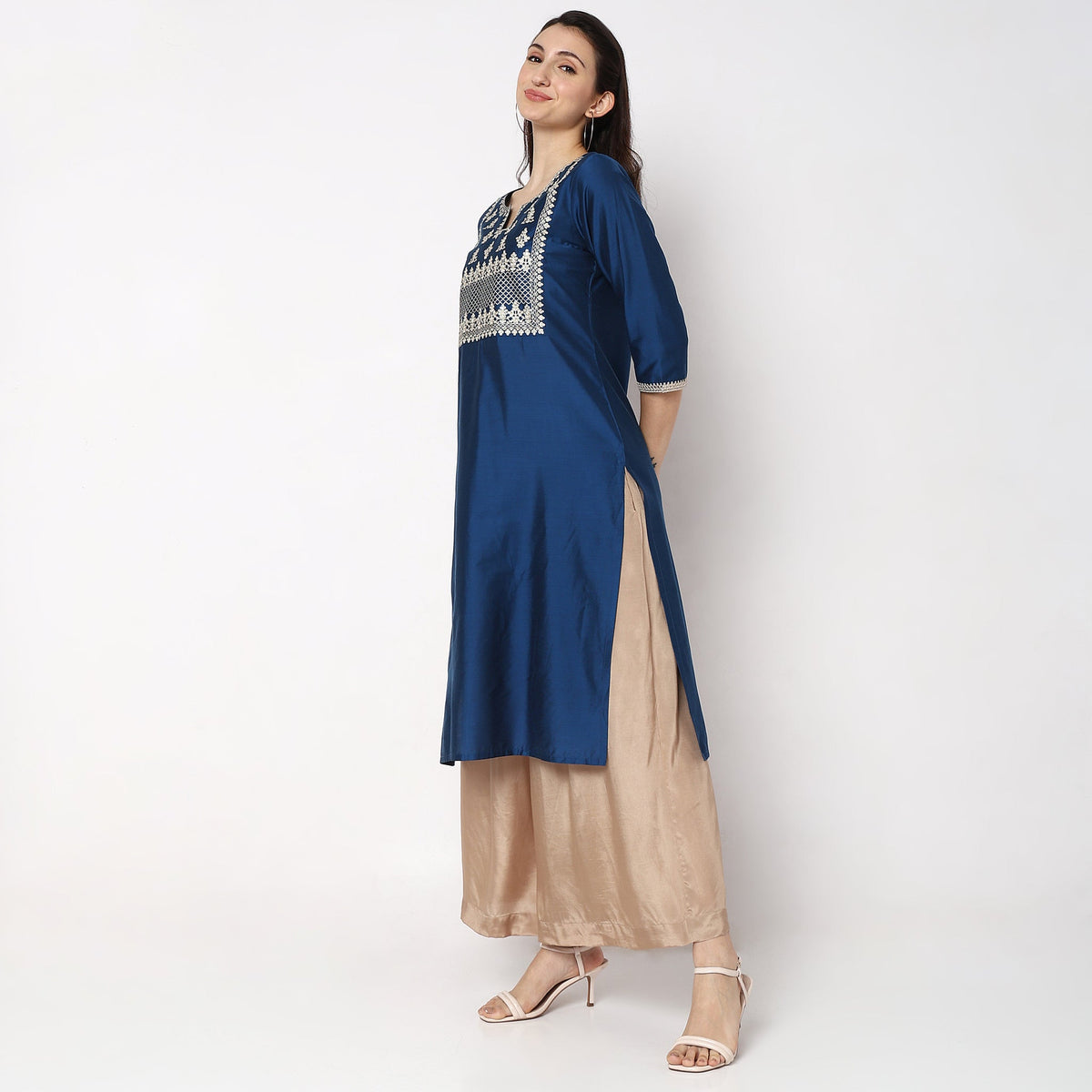 Women Wearing Straight Fit Embroidered Kurta