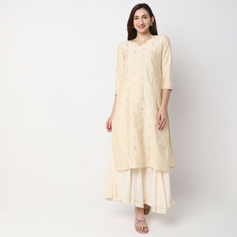 Women Wearing Straight Fit Embroidered Kurta