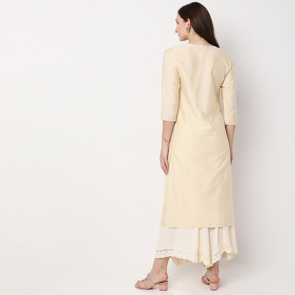 Women Wearing Straight Fit Embroidered Kurta