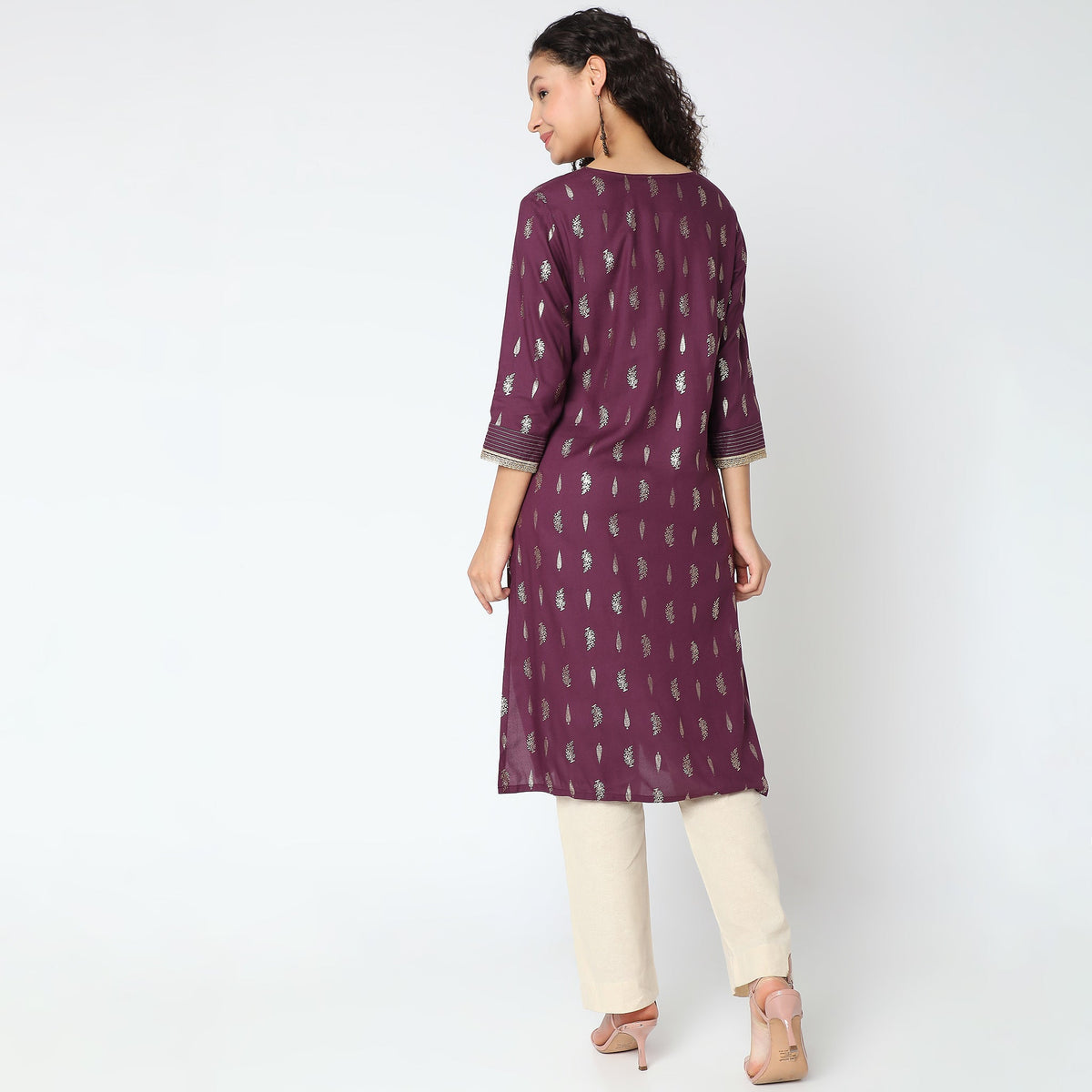 Women Wearing Straight Fit Printed Kurta