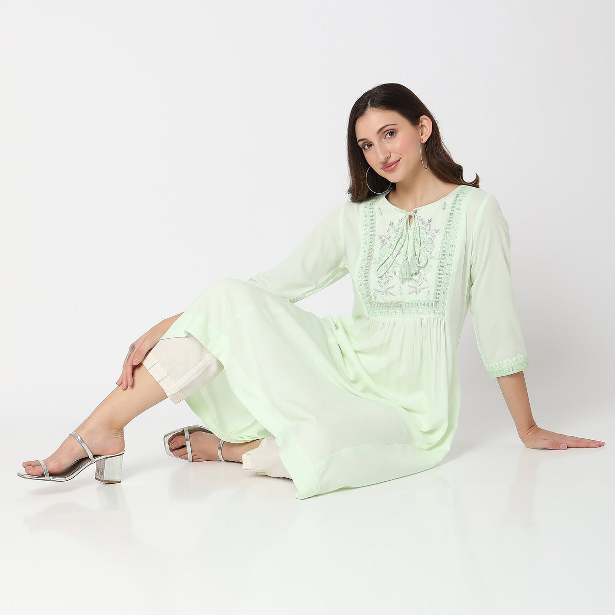 Women Wearing Flare Fit Embroidered Kurta