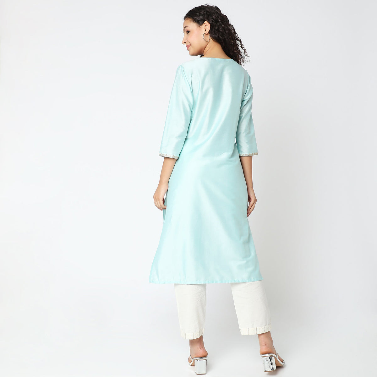 Women Wearing Straight Fit Embroidered Kurta