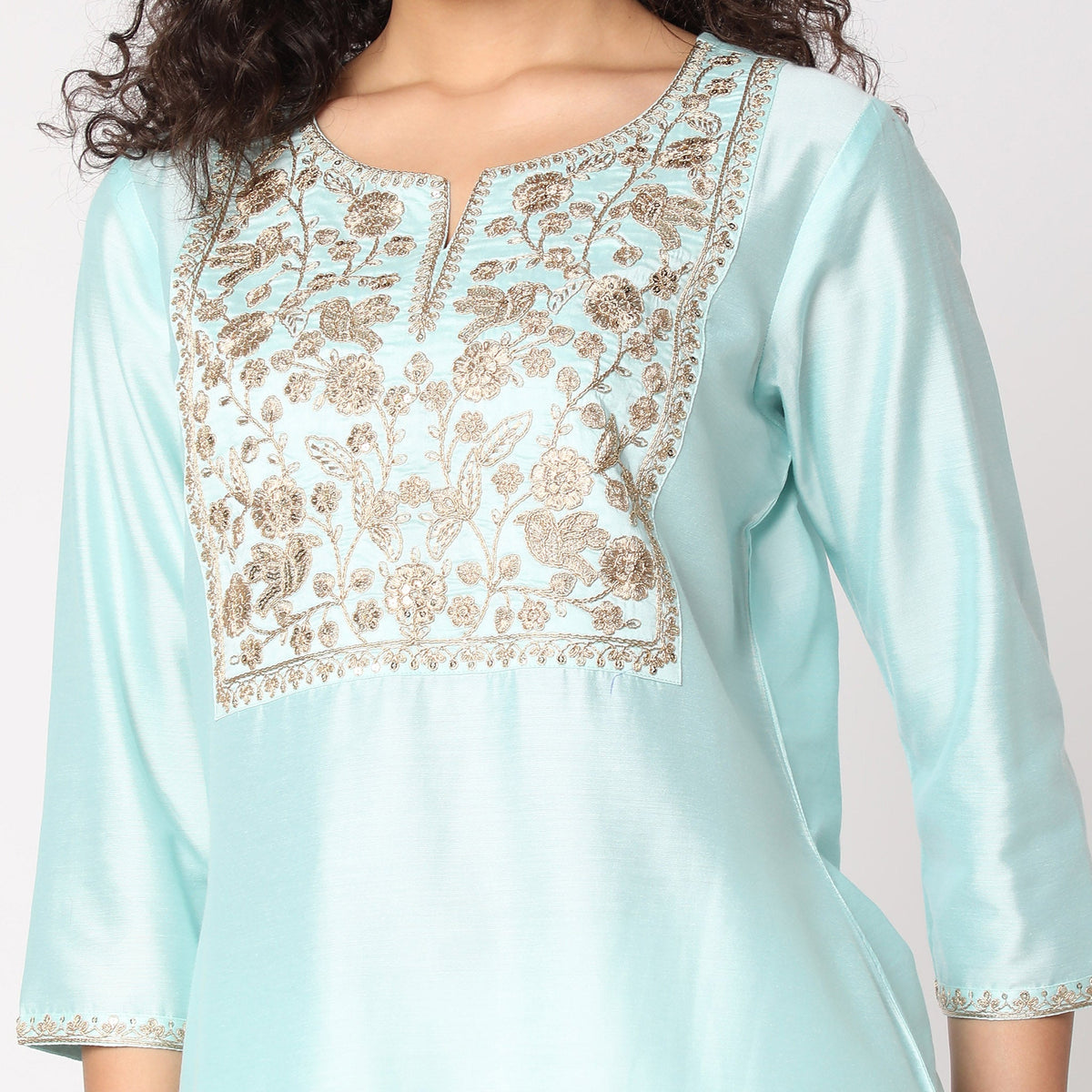 Women Wearing Straight Fit Embroidered Kurta