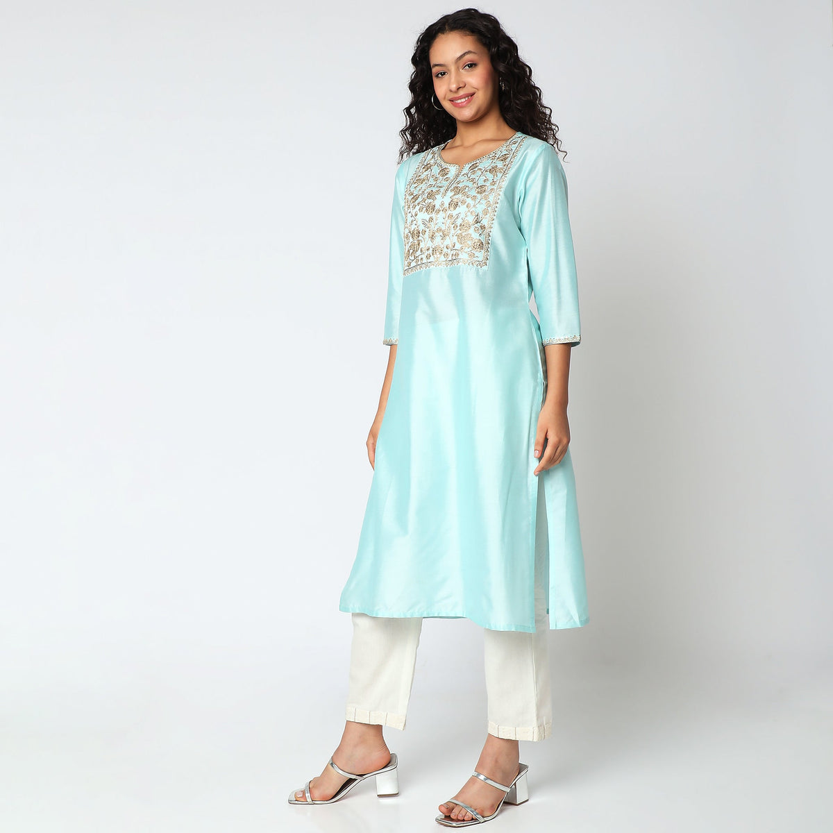 Women Wearing Straight Fit Embroidered Kurta