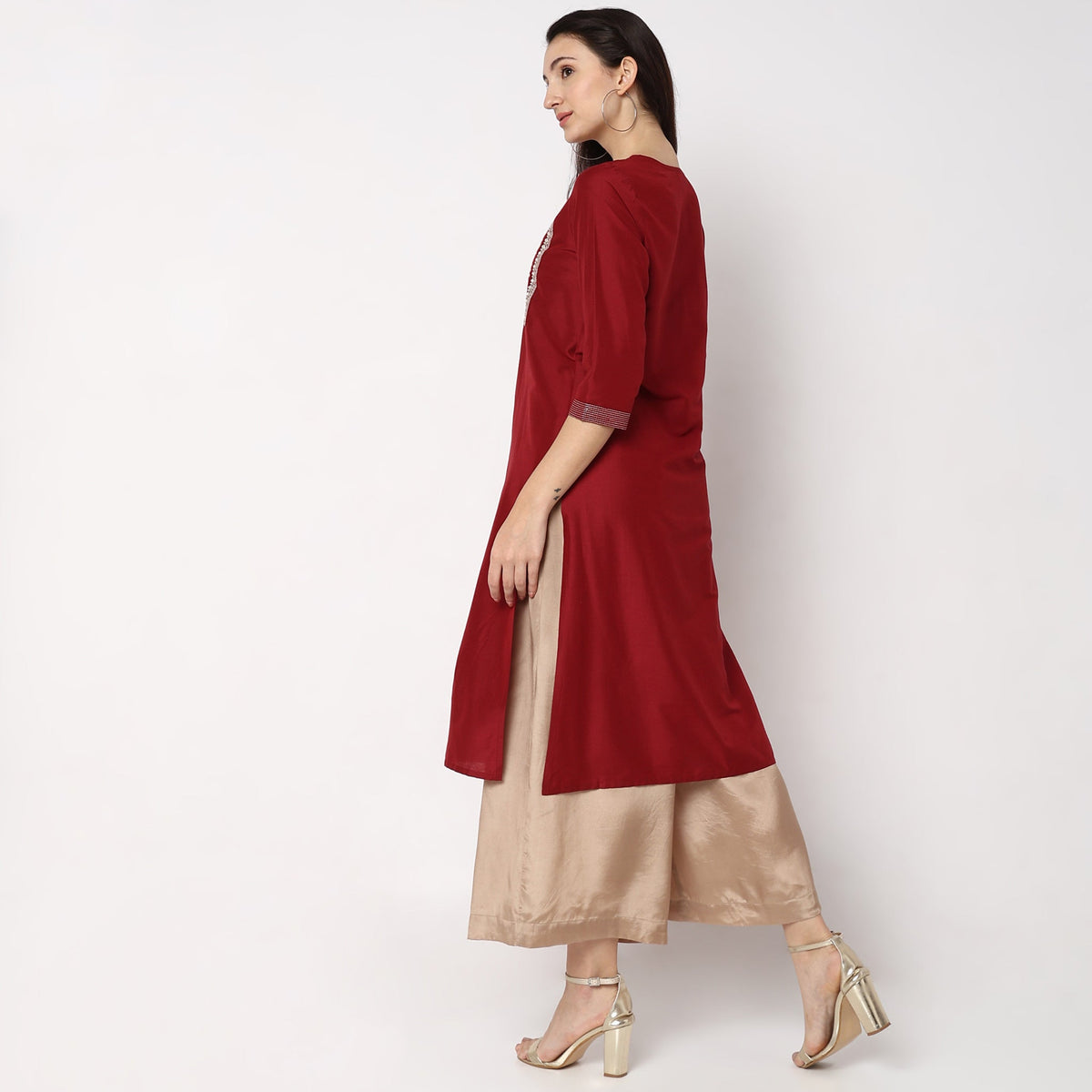 Women Wearing Straight Fit Embroidered Kurta