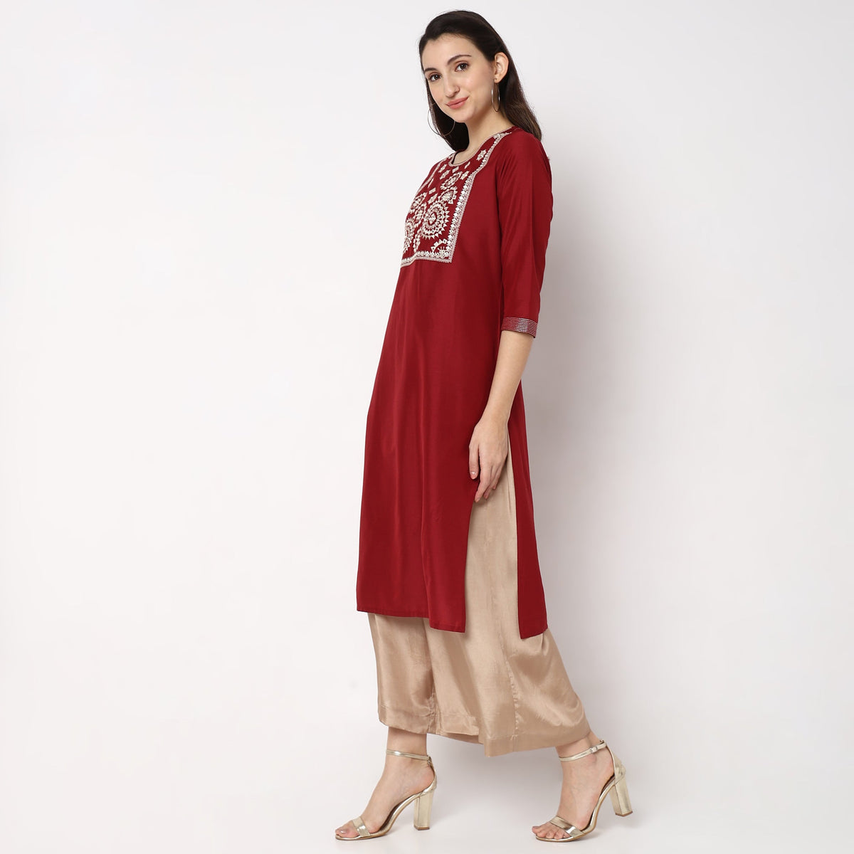 Women Wearing Straight Fit Embroidered Kurta