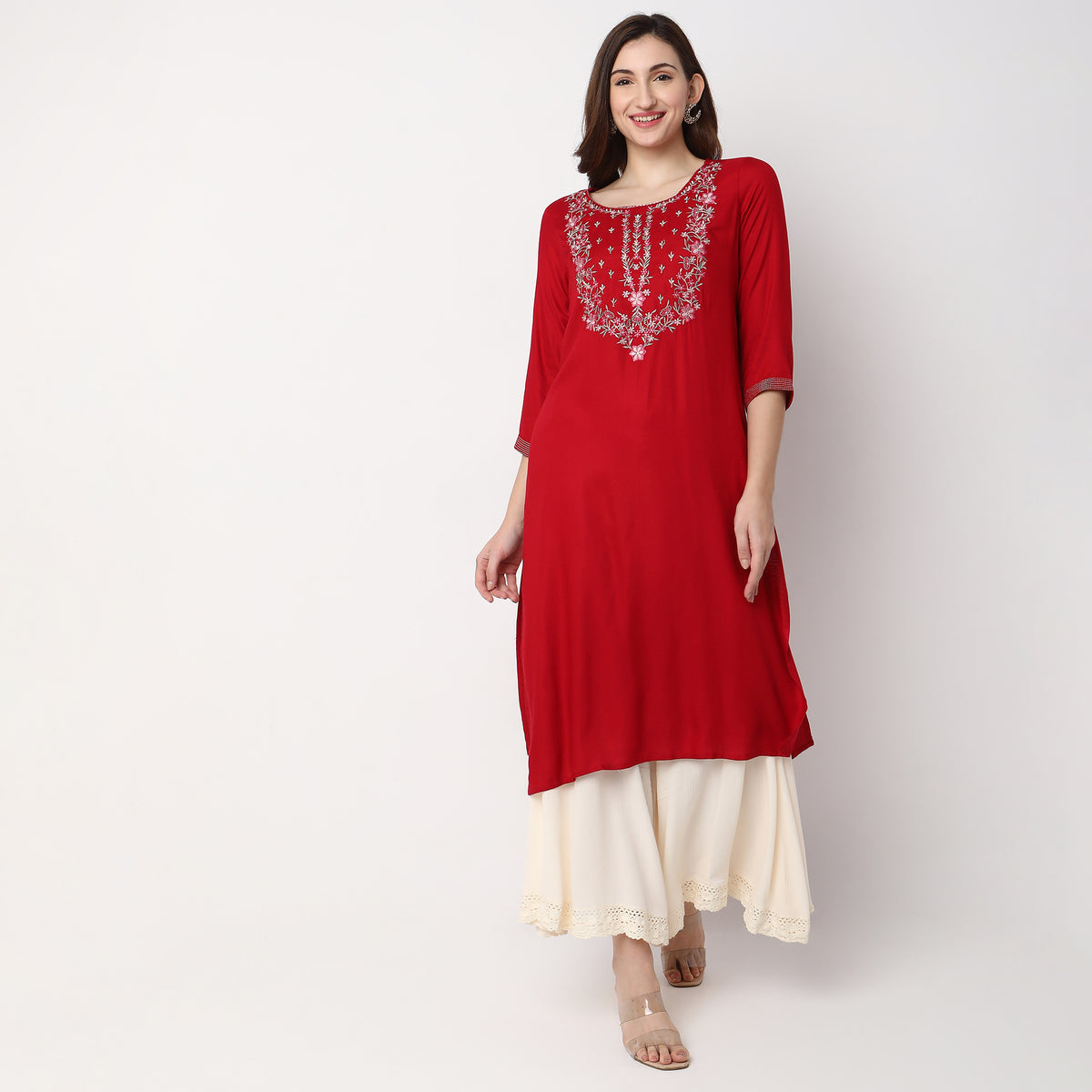 Women Wearing Straight Fit Embroidered Kurta