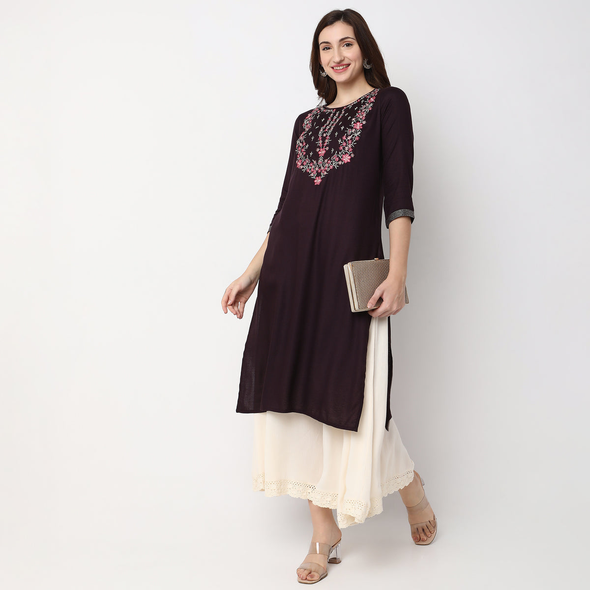 Women Wearing Straight Fit Embroidered Kurta