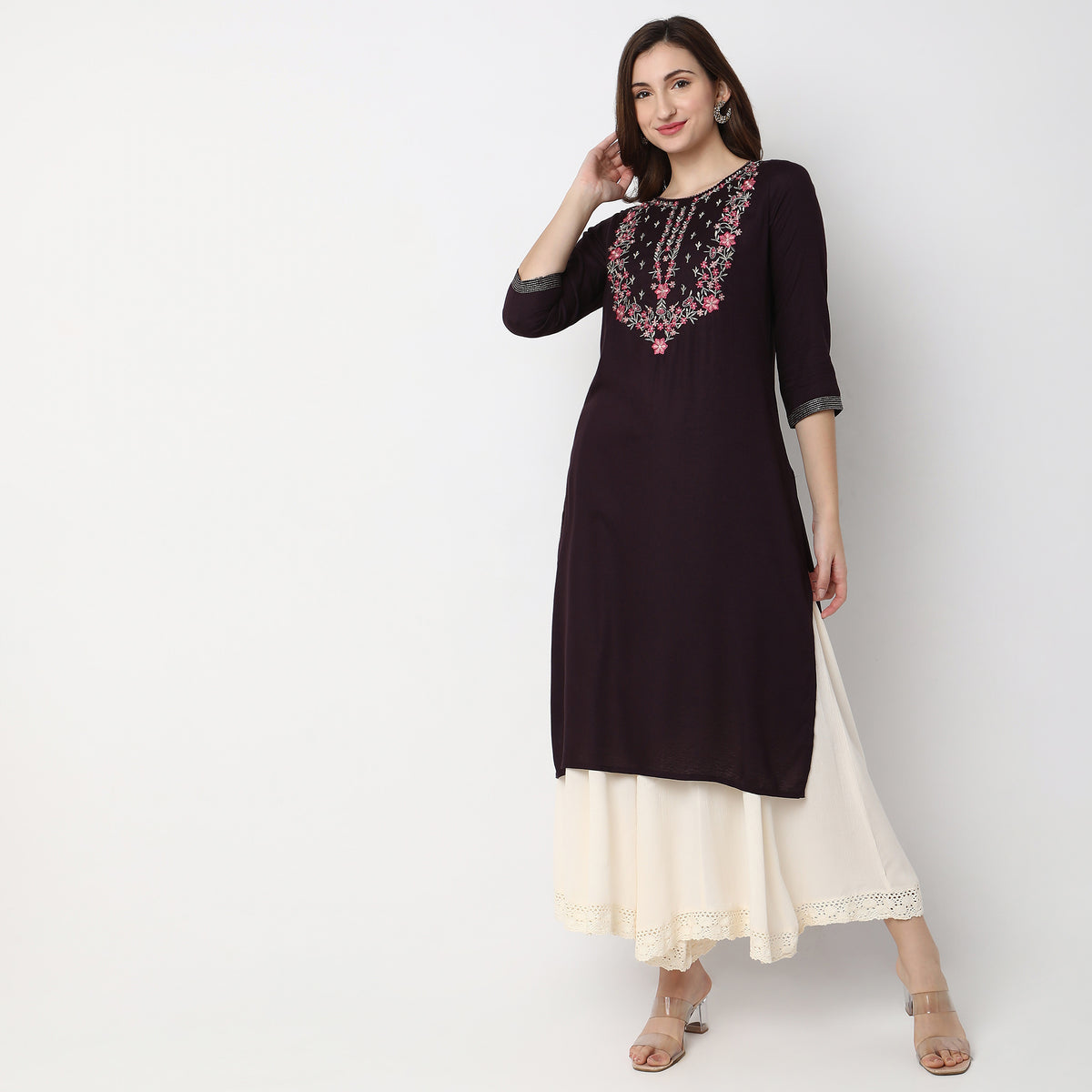 Women Wearing Straight Fit Embroidered Kurta