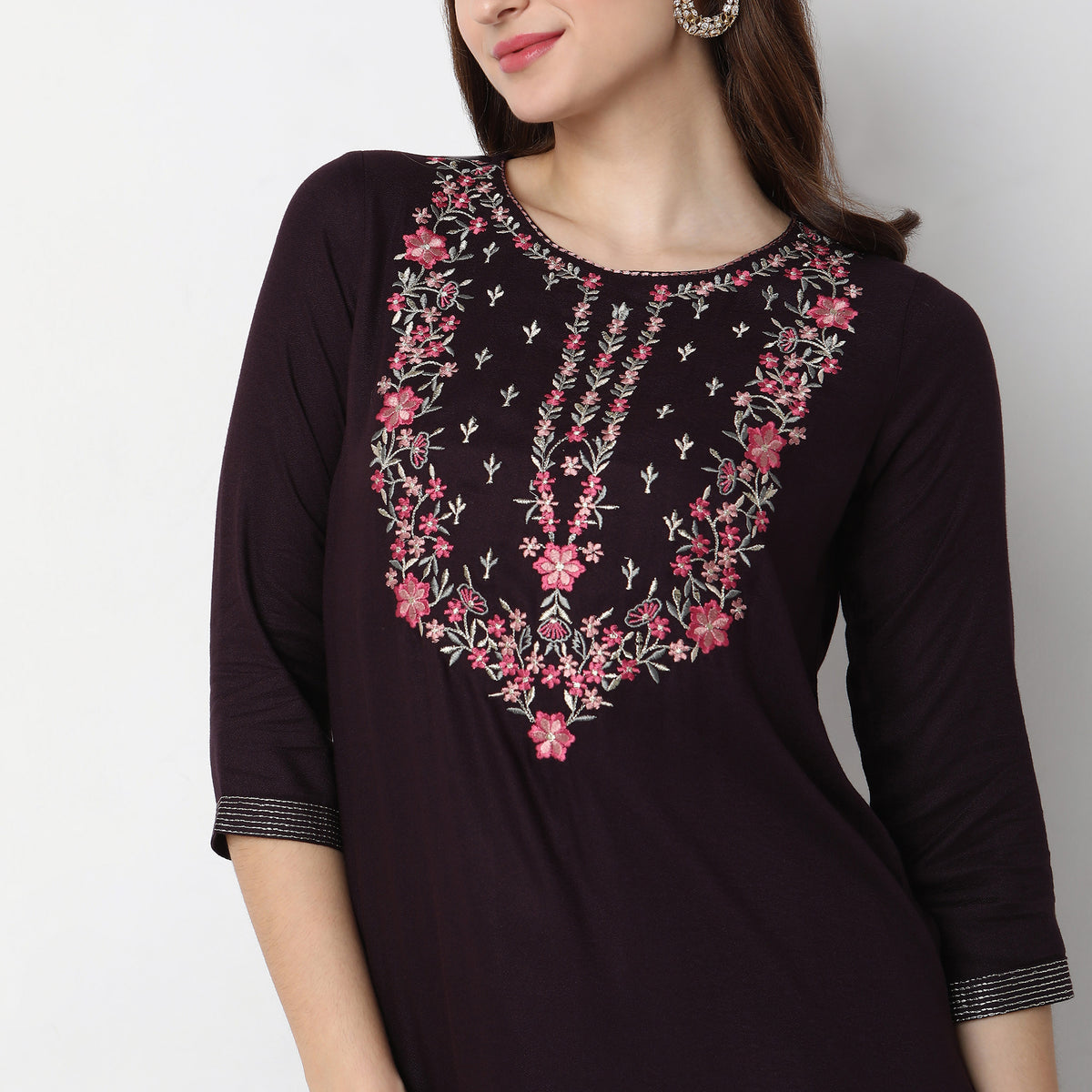 Women Wearing Straight Fit Embroidered Kurta