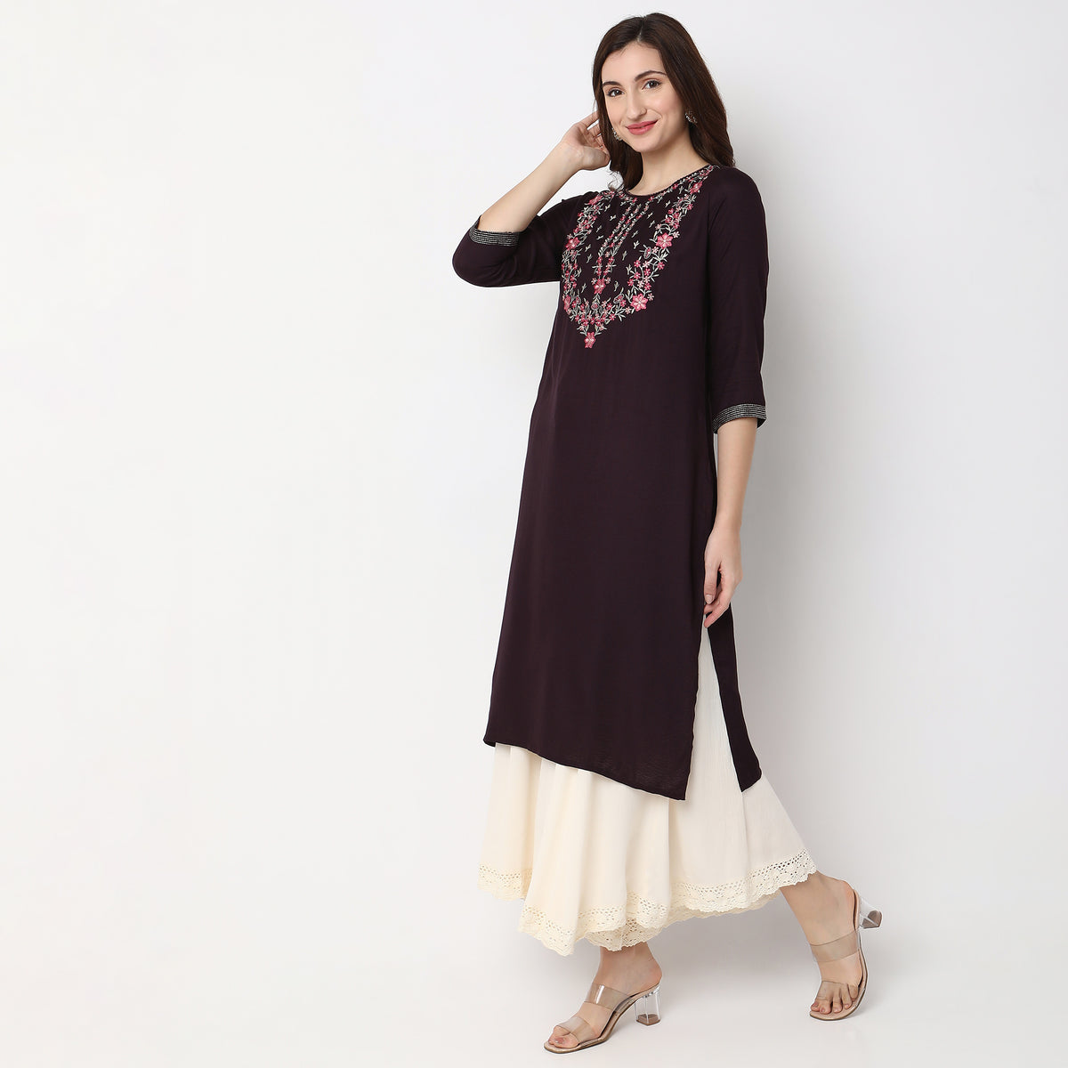 Women Wearing Straight Fit Embroidered Kurta