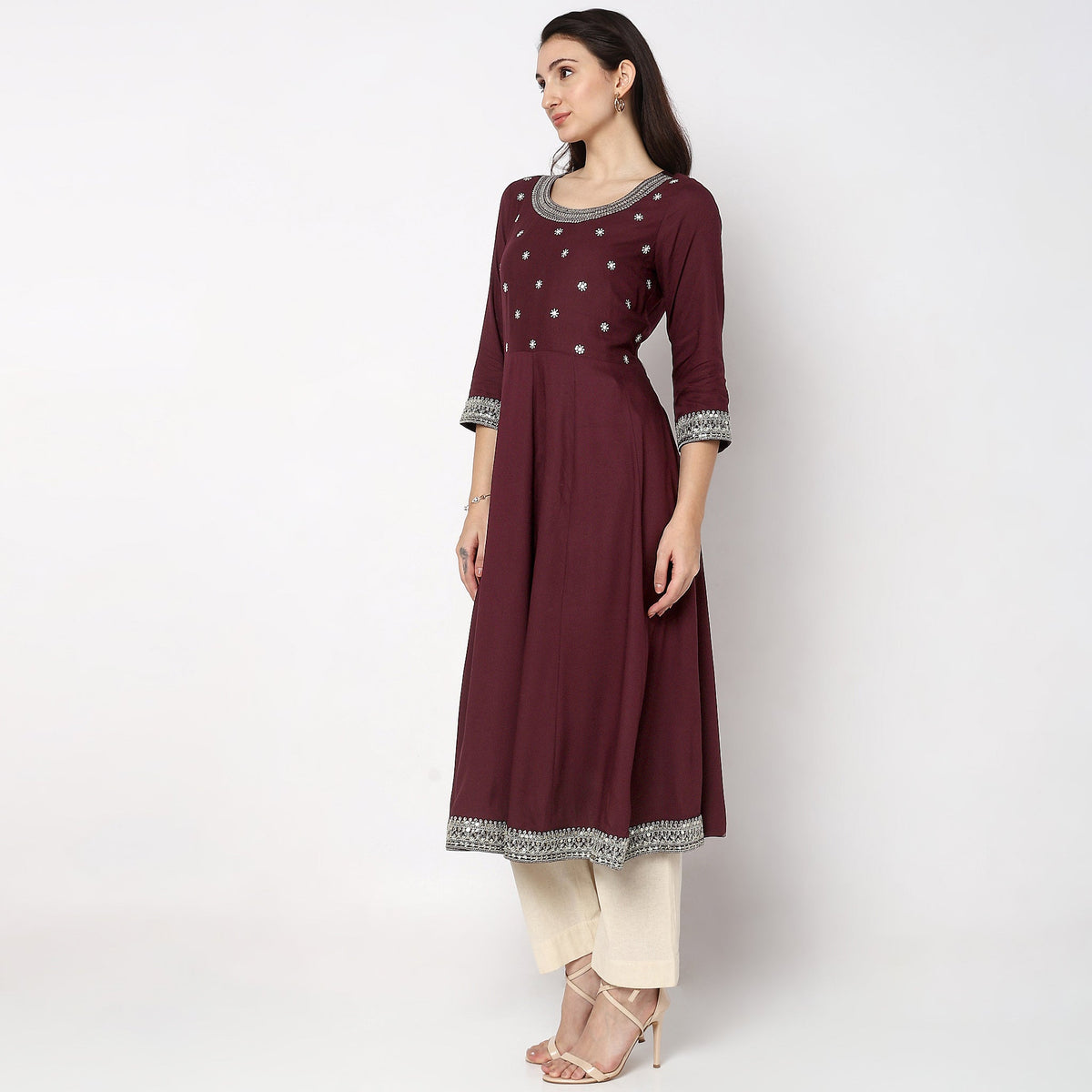 Women Wearing Flare Fit Embroidered Kurta