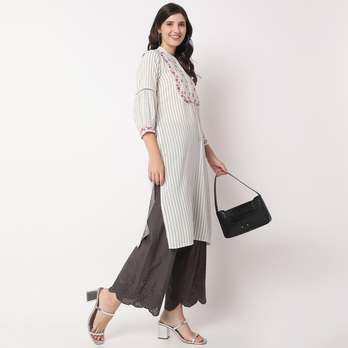 Women Wearing Flare Fit Solid High Rise Palazzo