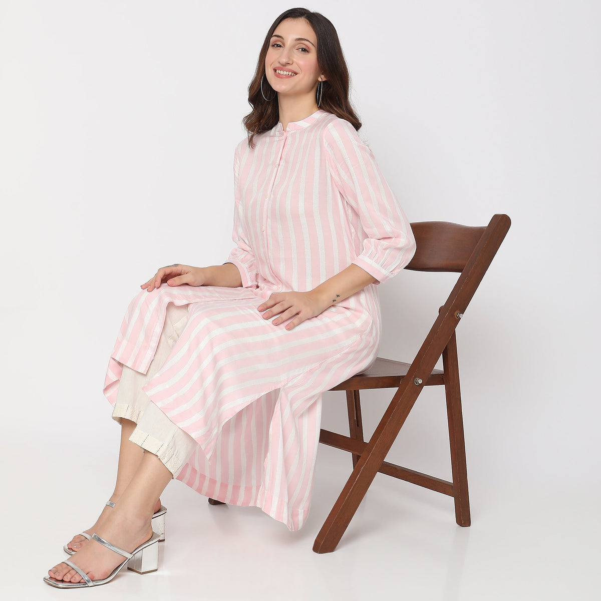 Women Wearing Flare Fit Striped Kurta