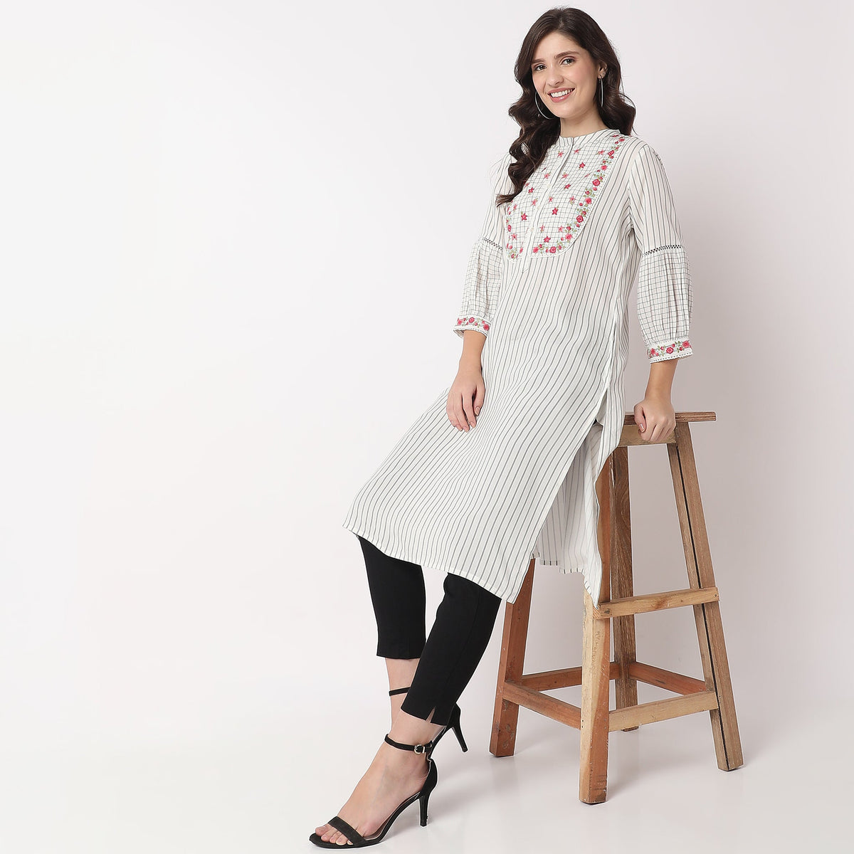 Women Wearing Flare Fit Checkered Kurta