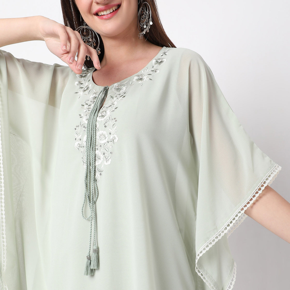 Women Wearing Boxy Fit Embroidered Kurta