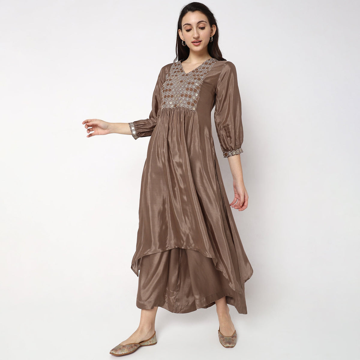 Women Wearing Regular Fit Embellished Kurta