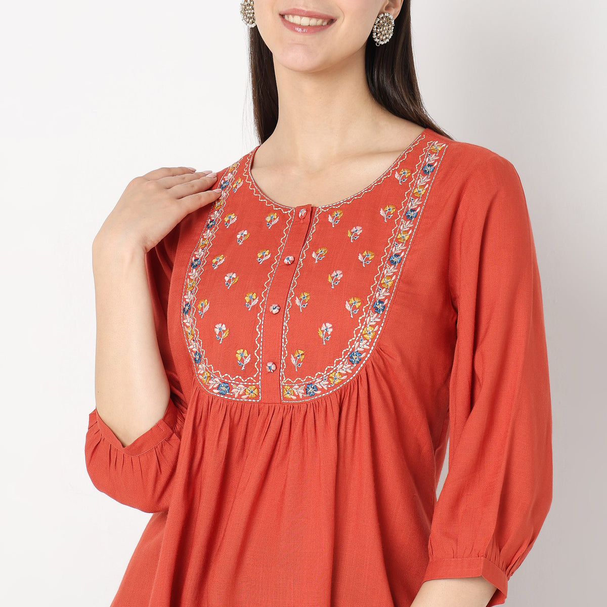 Mid Flare Embroidered Top