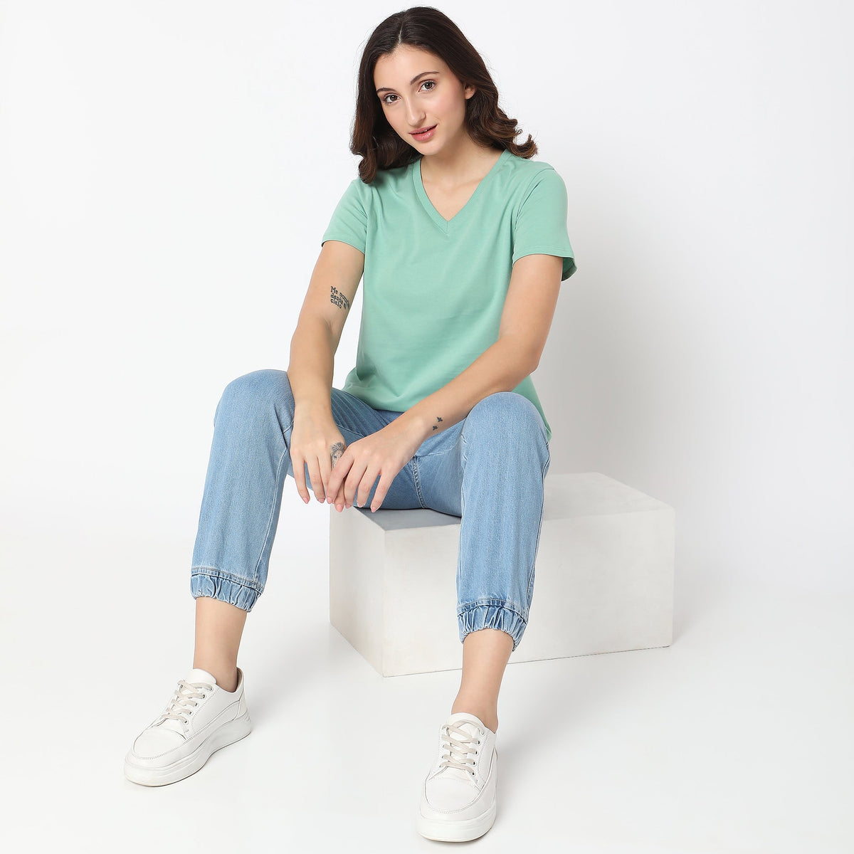 Women Wearing Regular Fit Solid T-Shirt