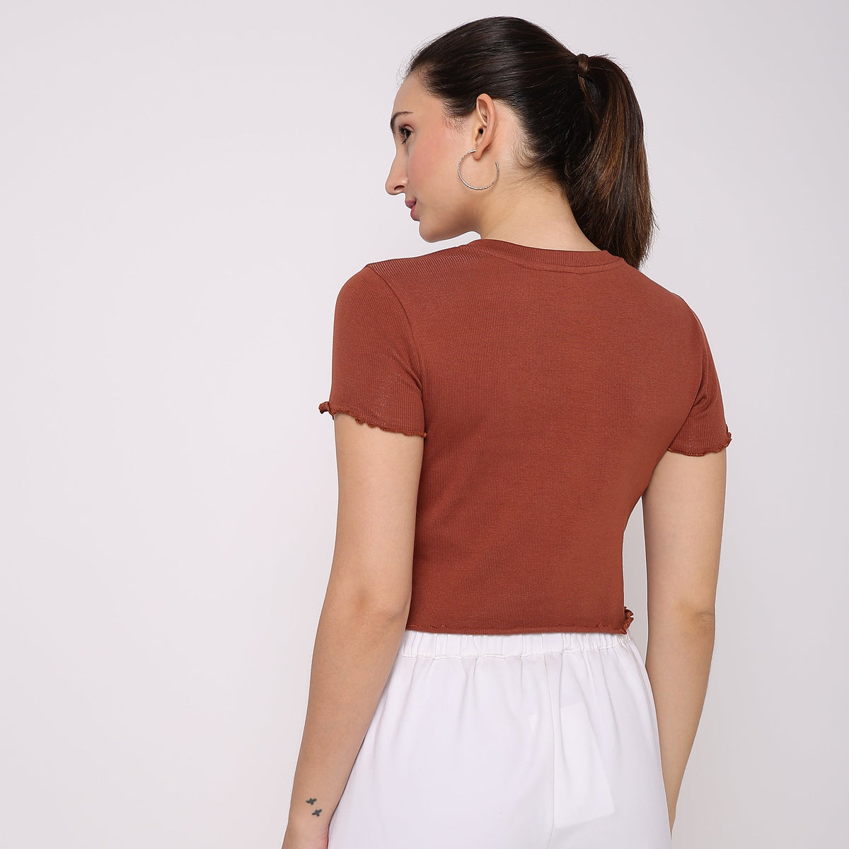 Women Wearing Slim Fit Solid T-Shirt