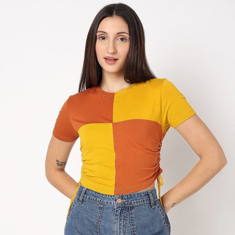 Women Wearing Skinny Fit Solid T-Shirt