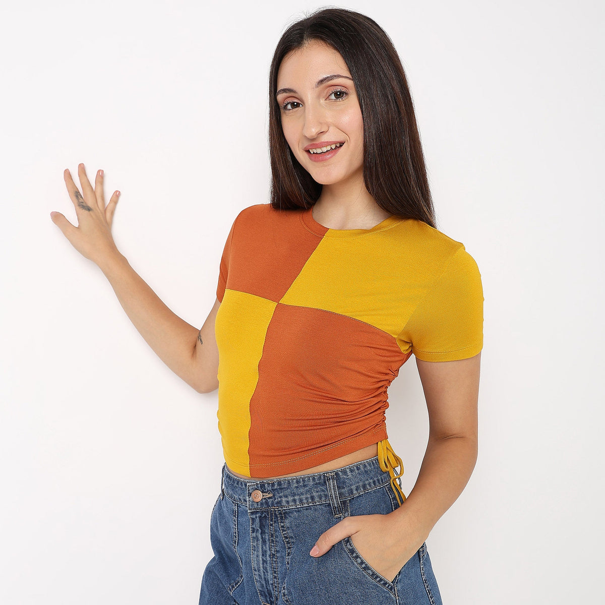 Women Wearing Skinny Fit Solid T-Shirt