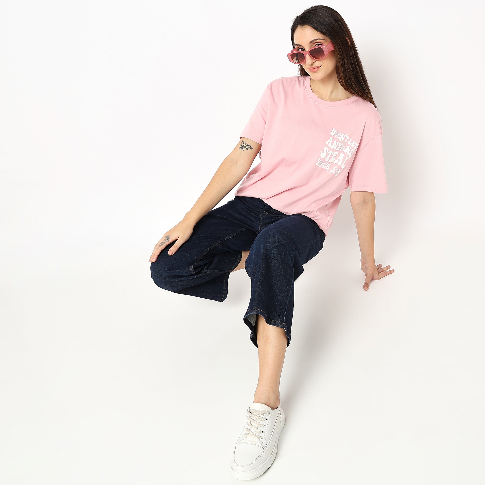 Women Wearing Oversize Graphic T-Shirt