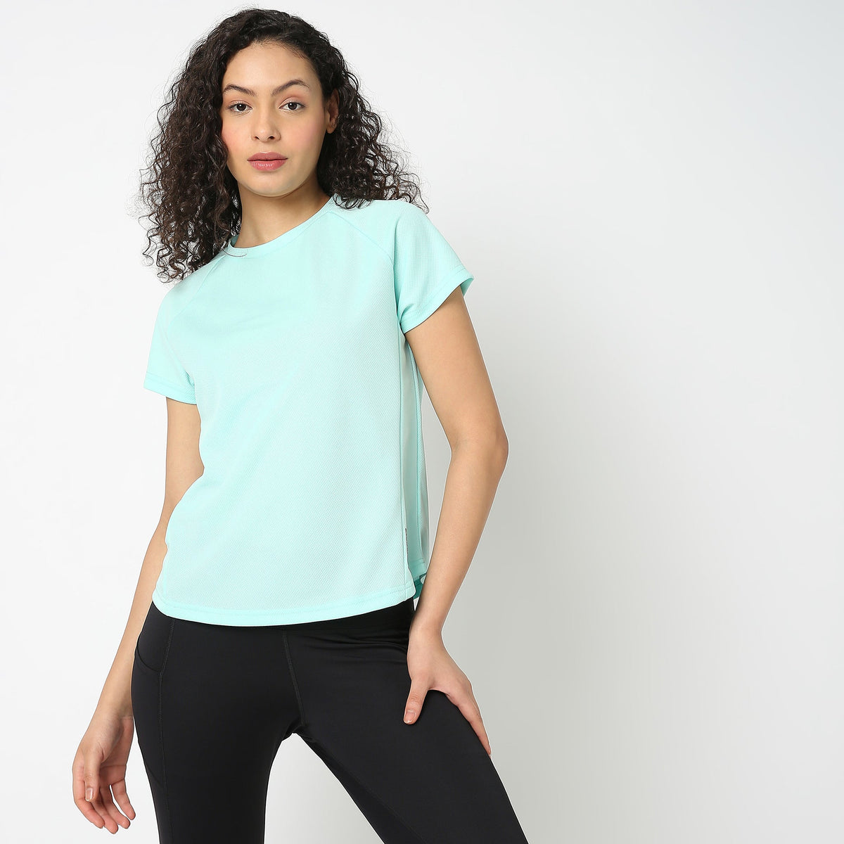 Women Wearing Regular Fit Solid T-Shirt