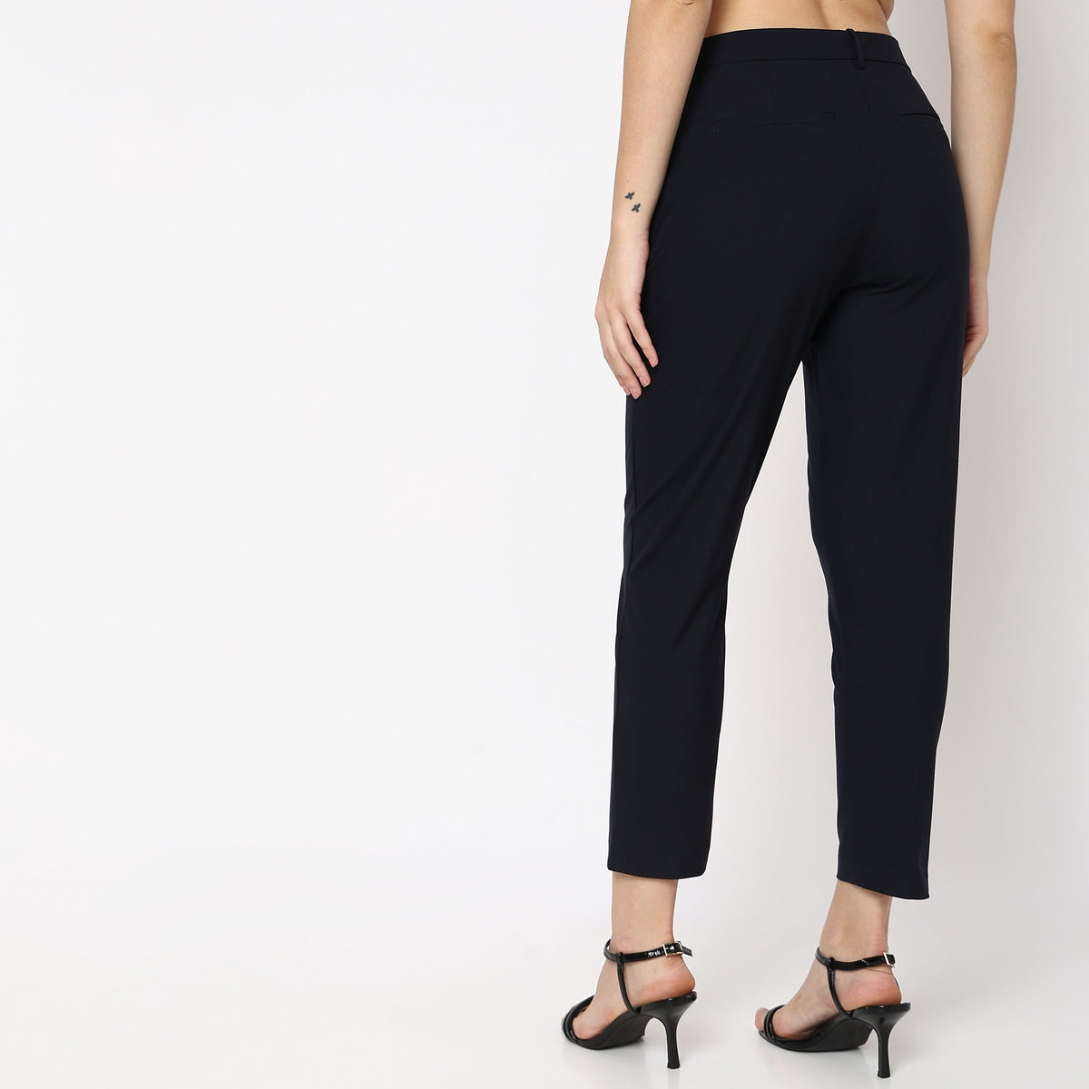 Women Wearing Straight Fit Solid Mid Rise Trouser