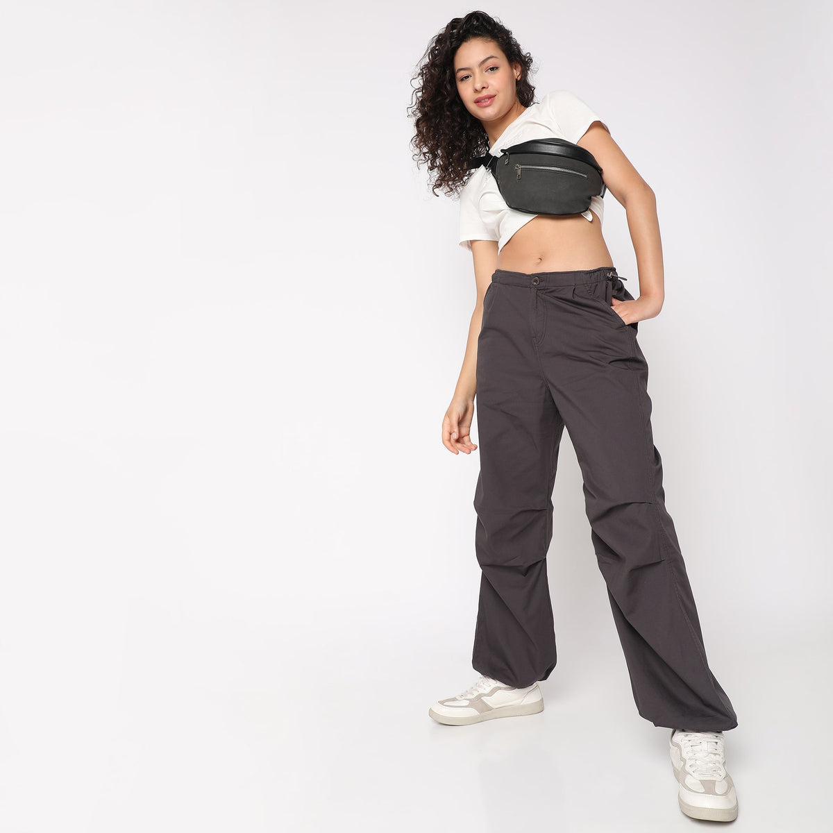 Women Wearing Regular Fit Solid Mid Rise Trouser