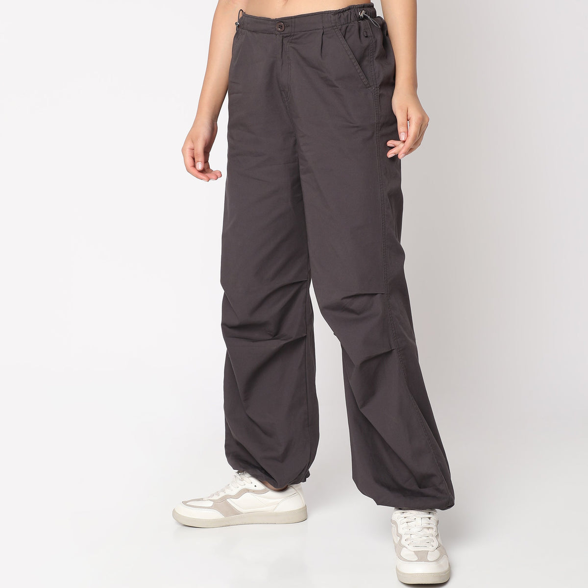 Women Wearing Regular Fit Solid Mid Rise Trouser