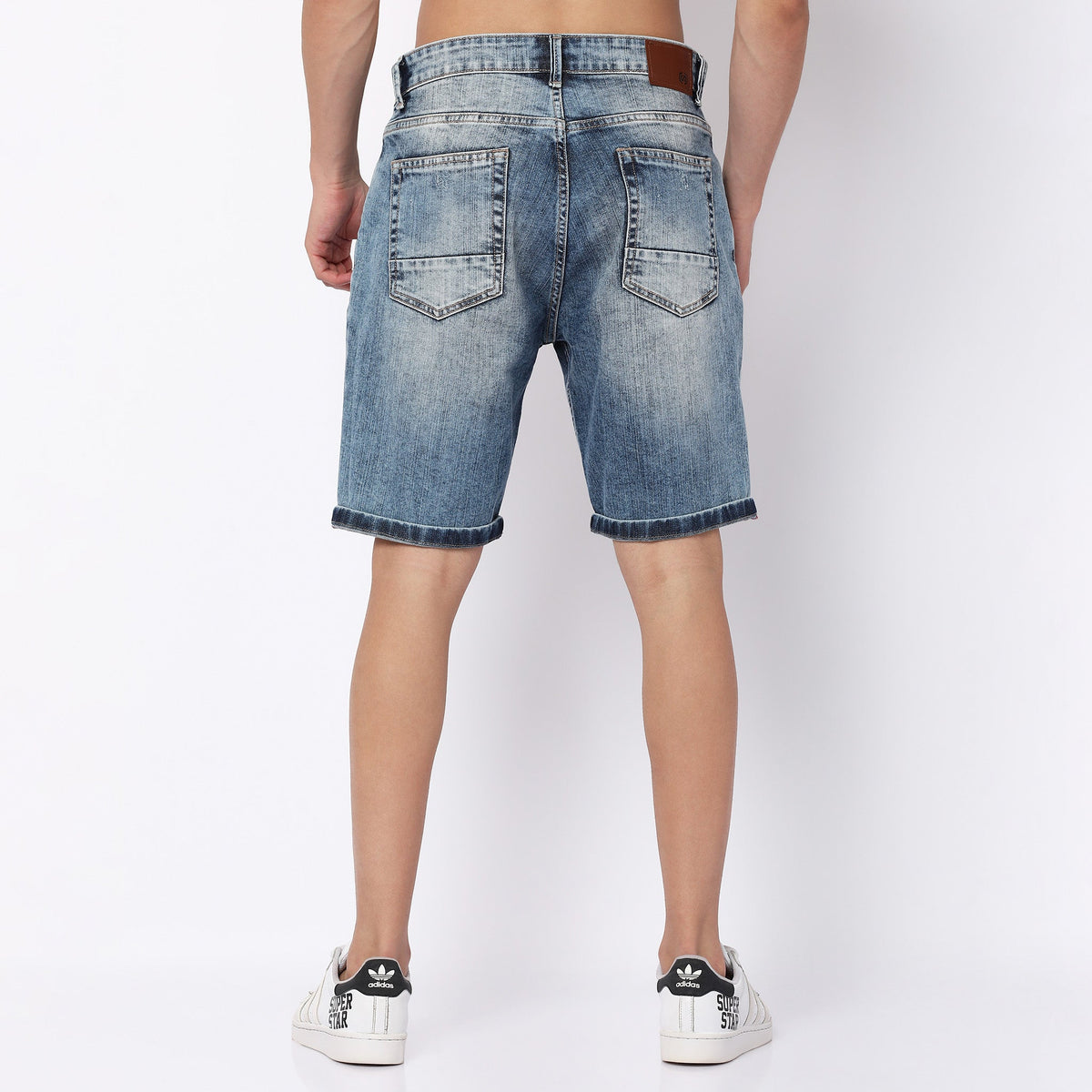 Men Wearing Regular Fit Distressed Low Rise Short