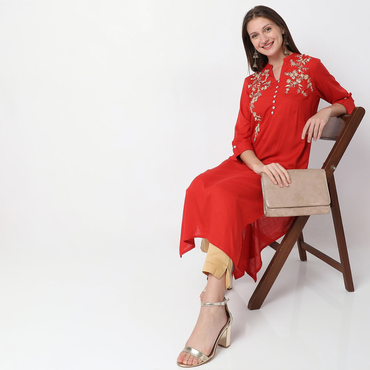 Women Wearing Straight Fit Embroidered Kurta