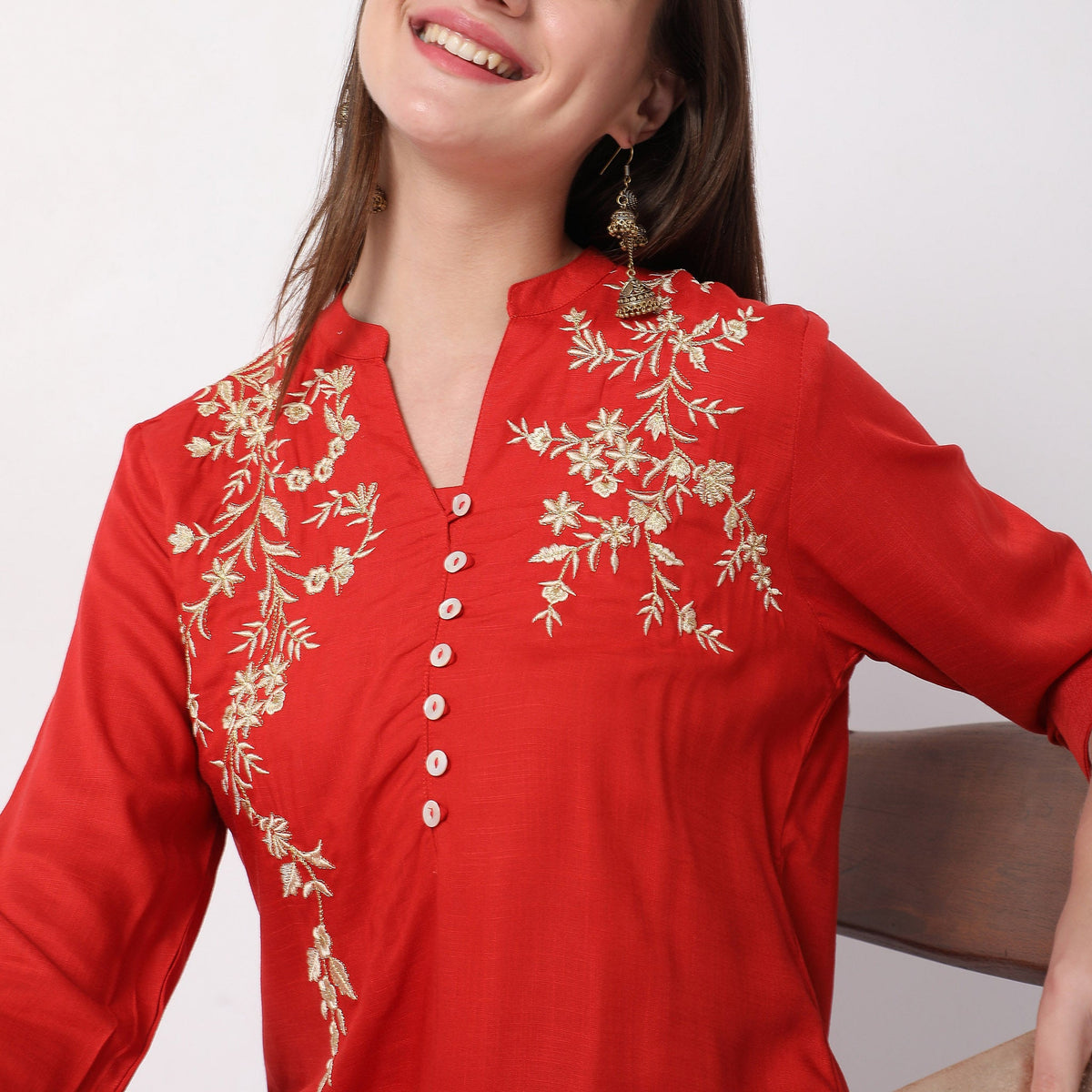 Women Wearing Straight Fit Embroidered Kurta