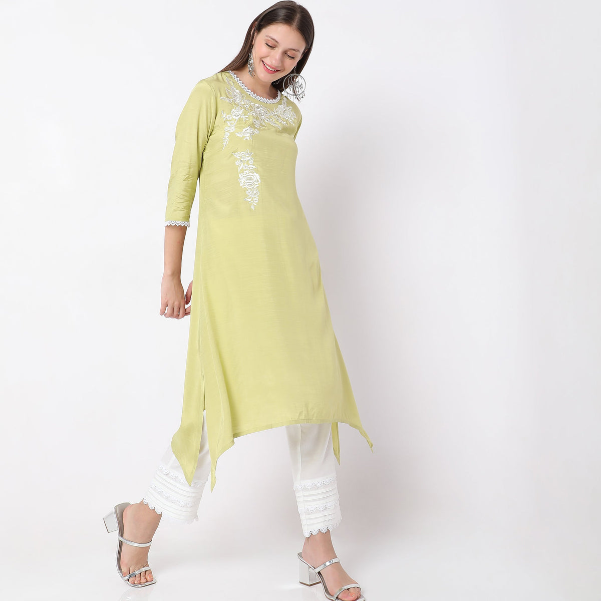 Women Wearing Straight Fit Embroidered Kurta