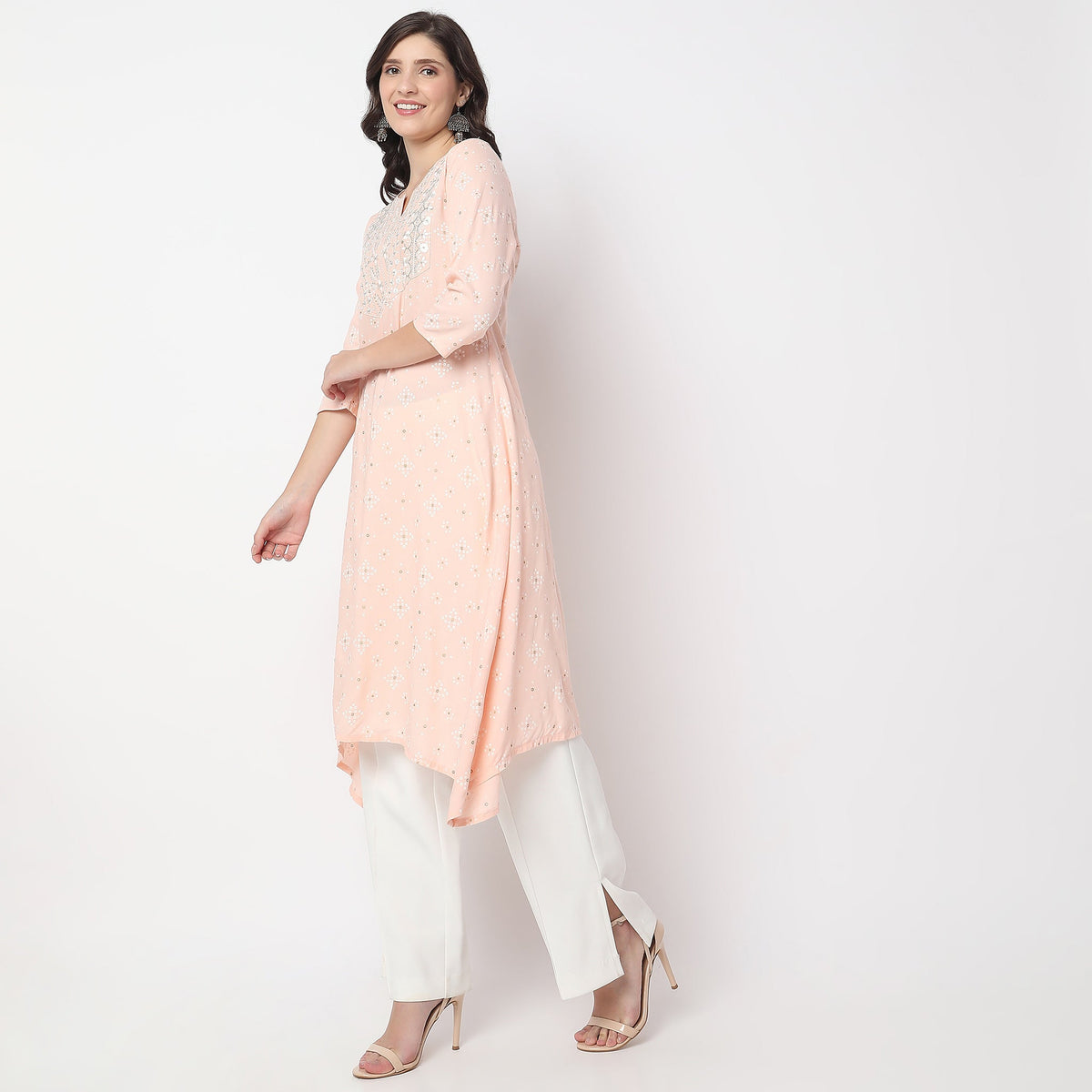 Women Wearing Flare Fit Embroidered Kurta