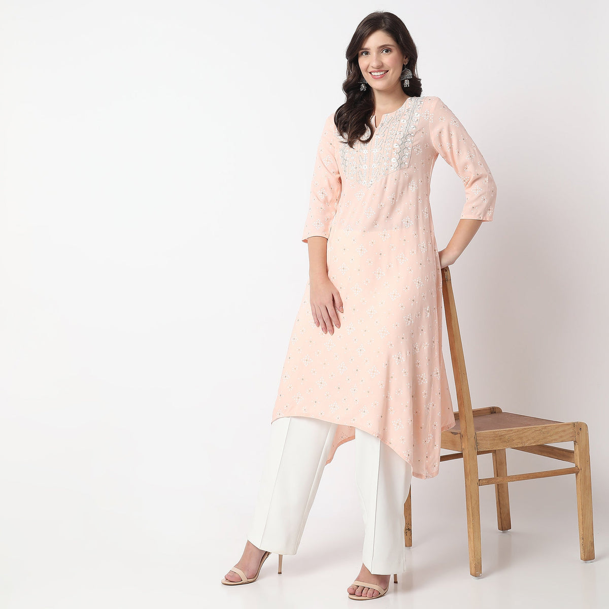 Women Wearing Flare Fit Embroidered Kurta