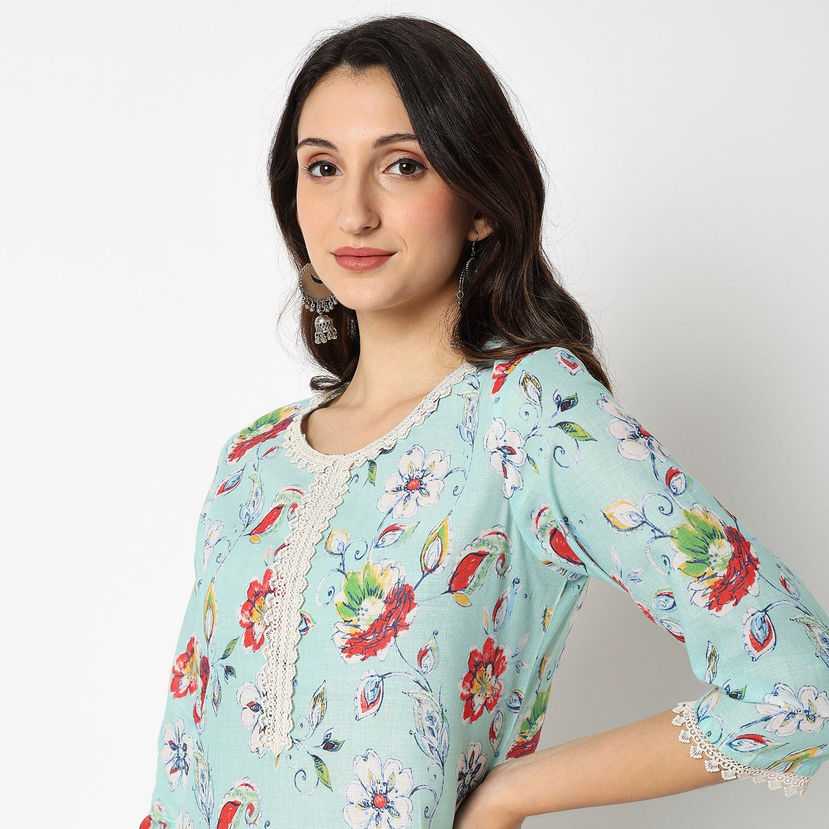 Women Wearing Straight Fit Solid Kurta