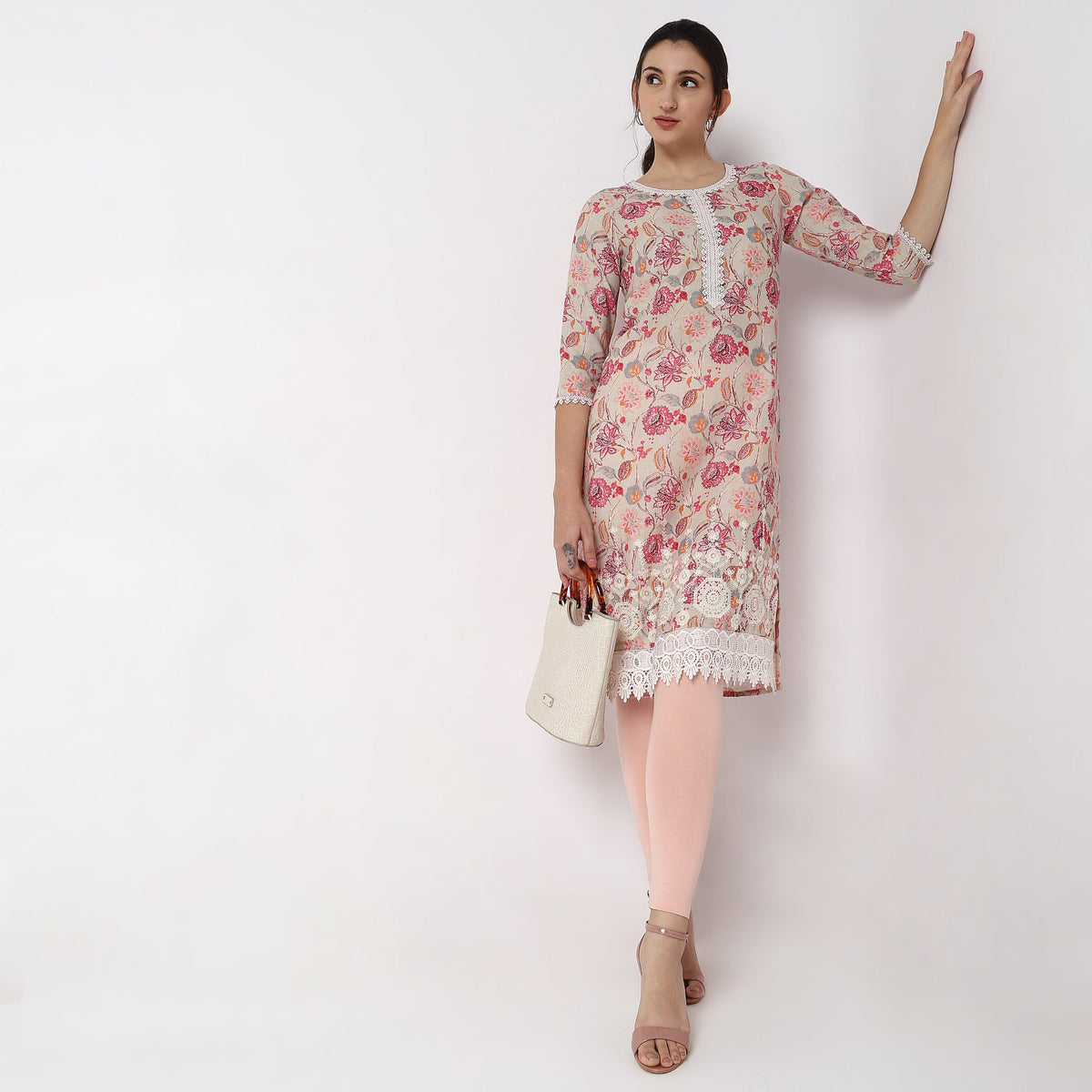 Women Wearing Straight Fit Printed Kurta