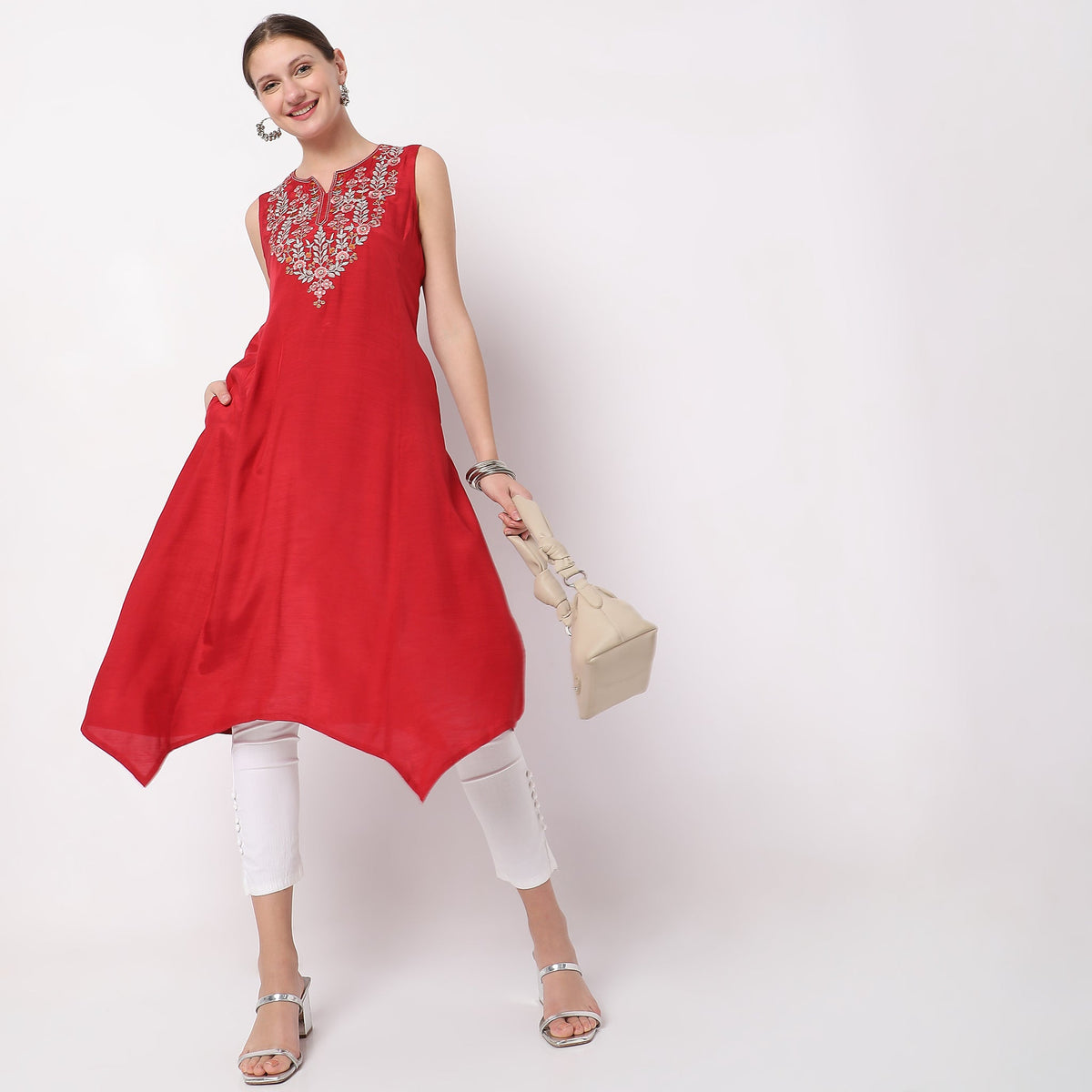 Women Wearing Flare Fit Embroidered Kurta