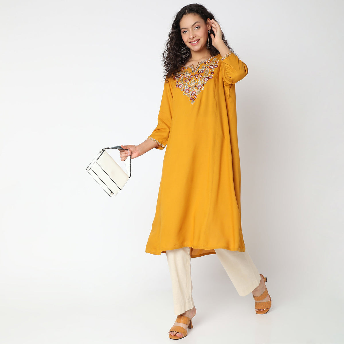 Women Wearing Flare Fit Embroidered Kurta