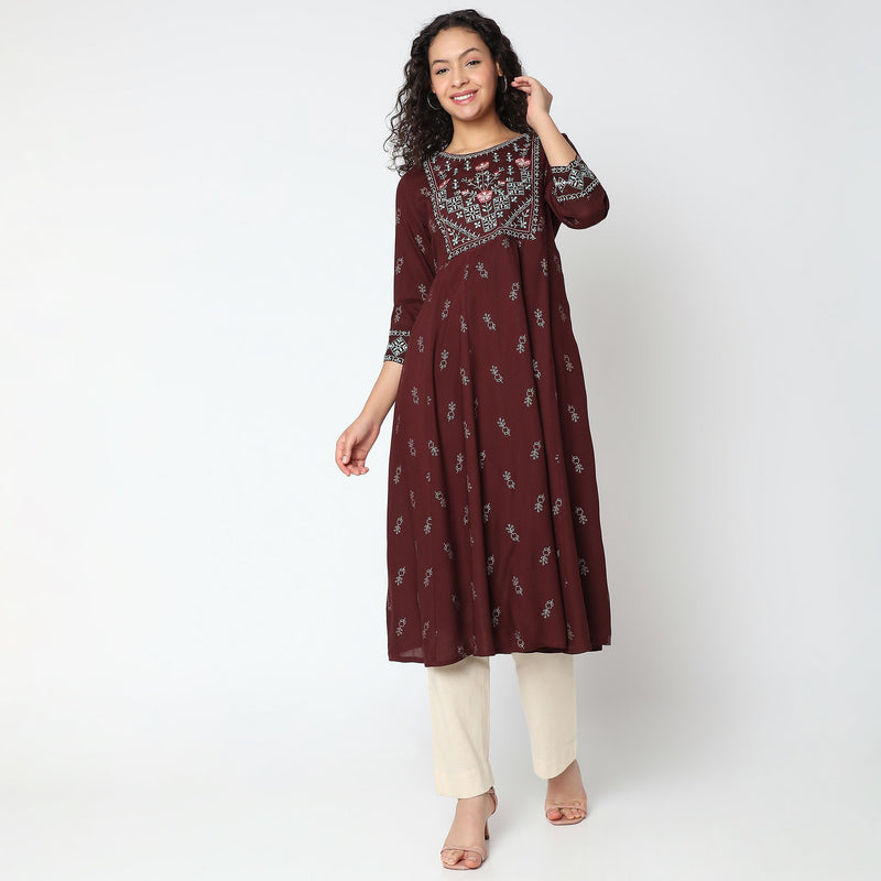 Women Wearing Flare Fit Embroidered Kurta