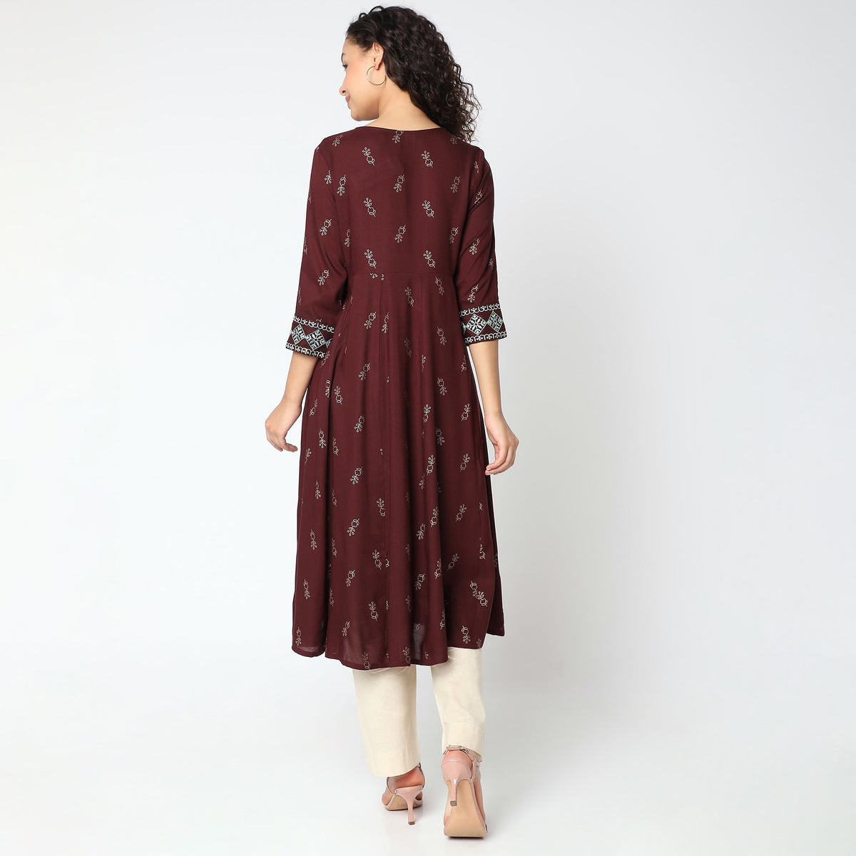 Women Wearing Flare Fit Embroidered Kurta