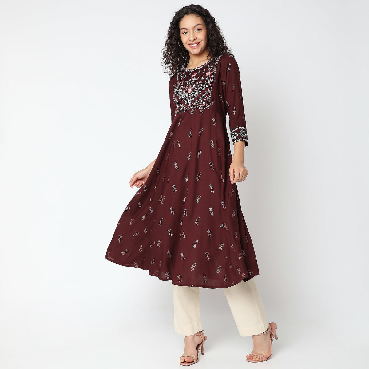 Women Wearing Flare Fit Embroidered Kurta