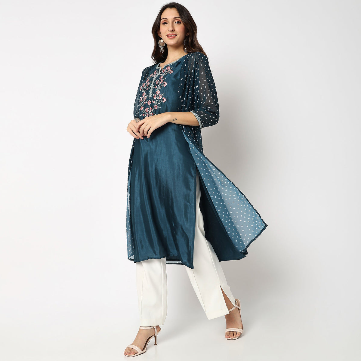 Women Wearing Flare Fit Embroidered Kurta