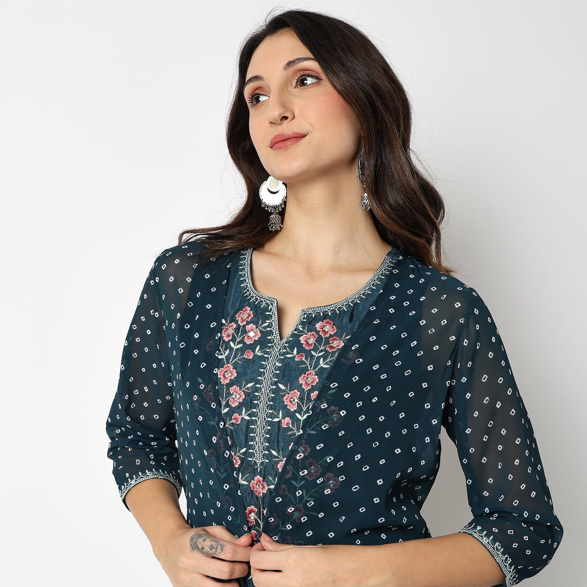 Women Wearing Flare Fit Embroidered Kurta